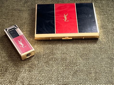 1980 ysl lighter rolla gas|Vintage “Yves Saint Laurent“ Cigarette Case and Lighter Set.